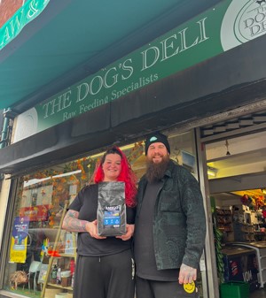 Owners outside The Dog's Deli